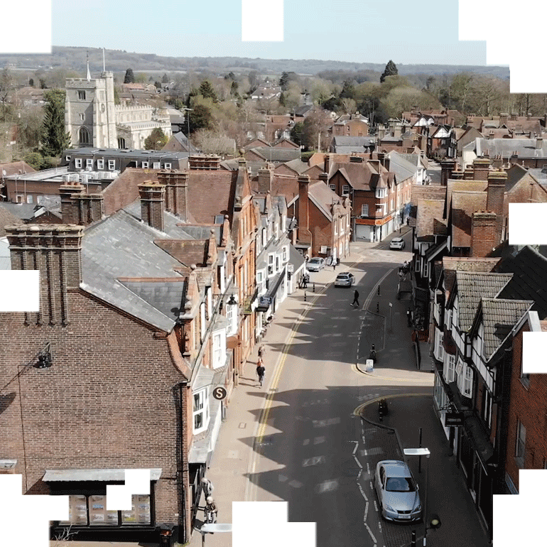 Video still from above a highstreet in Hertfordshire using a drone.